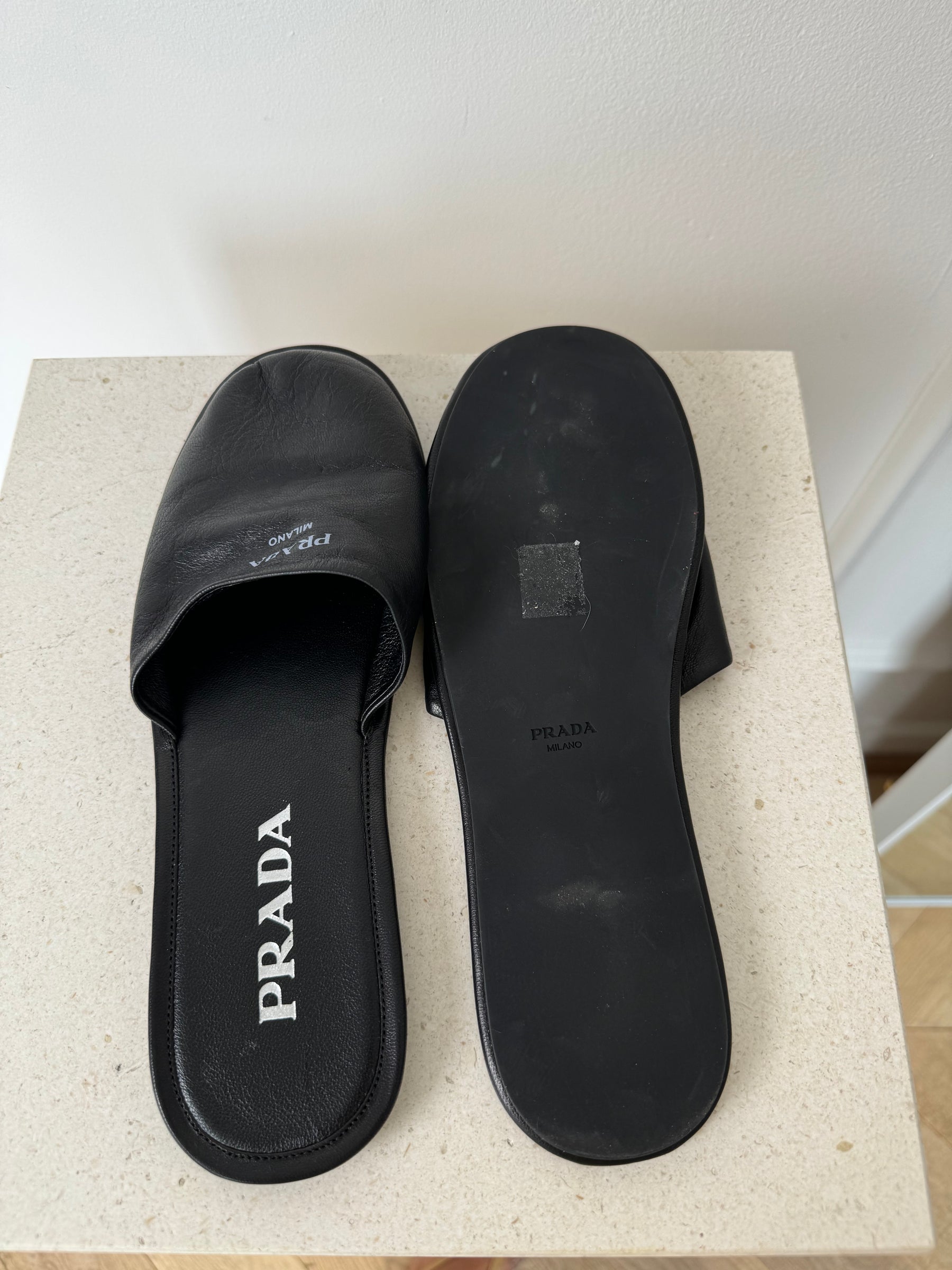 Prada Black Leather Slip On's, 38.5